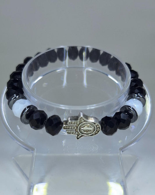 Hamsa and two-tone hand crystal bracelet.