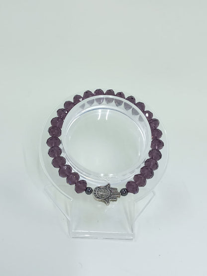 Crystal bracelet with Hamsa and St. Benedict Hand Charm.