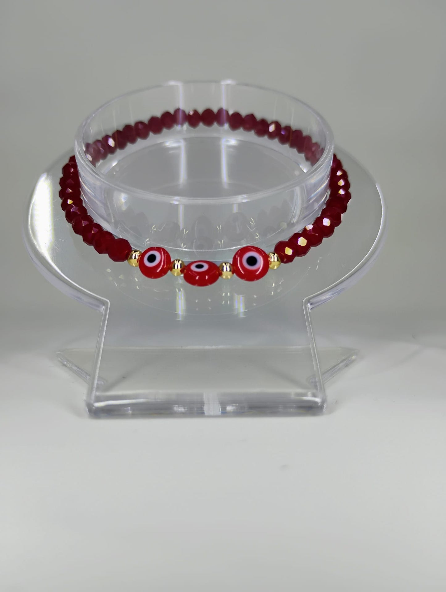 Red Turkish eye crystal bracelet gold laminated.