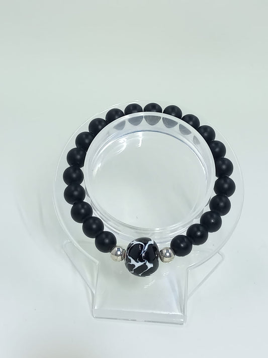 Black Onyx bracelet with Talavera charm.